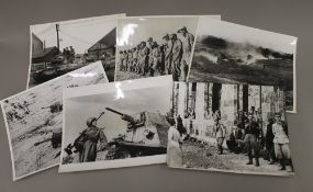 Twelve black and white Official War Office Second World War photographic prints depicting scenes