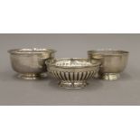 Three small silver bowls (14.