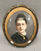 A 19th century painted porcelain plaque depicting a young woman