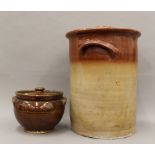 An antique stoneware churn and a stoneware crock