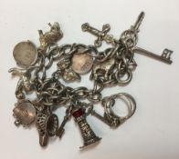 A silver charm bracelet (43 grammes total weight)