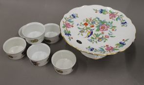 A boxed Aynsley tazza and Worcester ramekins