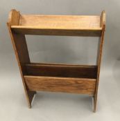 An early 20th century oak bookrack