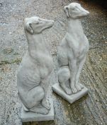 A pair of garden ornaments formed as greyhounds
