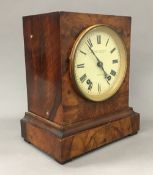 A Victorian walnut cased Camerer Kuss & Co mantle clock