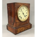 A Victorian walnut cased Camerer Kuss & Co mantle clock