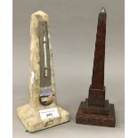 A variegated rouge marble obelisk,