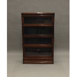 A mahogany Globe Wernicke bookcase. 141 cm high.