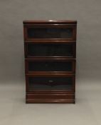 A mahogany Globe Wernicke bookcase. 141 cm high.