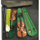 Two vintage cased violins and a vacant case