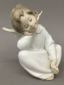 A Lladro porcelain model of an angel