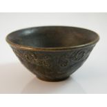 A small Chinese bronze bowl