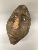 A tribal carved coconut,