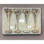 A set of four silver bud vases (12 troy ounces loaded)
