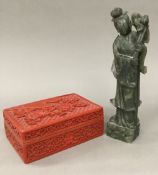 A cinnabar lacquered box and a figure of Guanyin