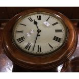 A Victorian walnut framed dial clock