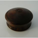 A rosewood cased compass