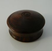 A rosewood cased compass