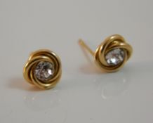 A pair of 9 ct gold stone set knot earrings