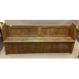 A Victorian pine pew