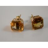 A pair of 9 ct gold and citrine earrings