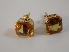 A pair of 9 ct gold and citrine earrings