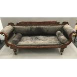 An early 19th century mahogany framed settee