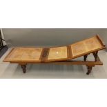 A Victorian caned mahogany day bed