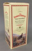 A boxed Wade Famous Grouse Whiskey bottle (full and sealed)