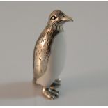 A silver model of a penguin