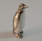 A silver model of a penguin