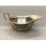 A silver sauce boat (2.