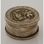 A small Chinese balm box. 2.25 cm high; 4.25 cm diameter.