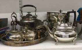 A quantity of silver plated wares, including tea sets, tray, etc.