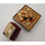 A small cased travelling chess and draughts set, etc.