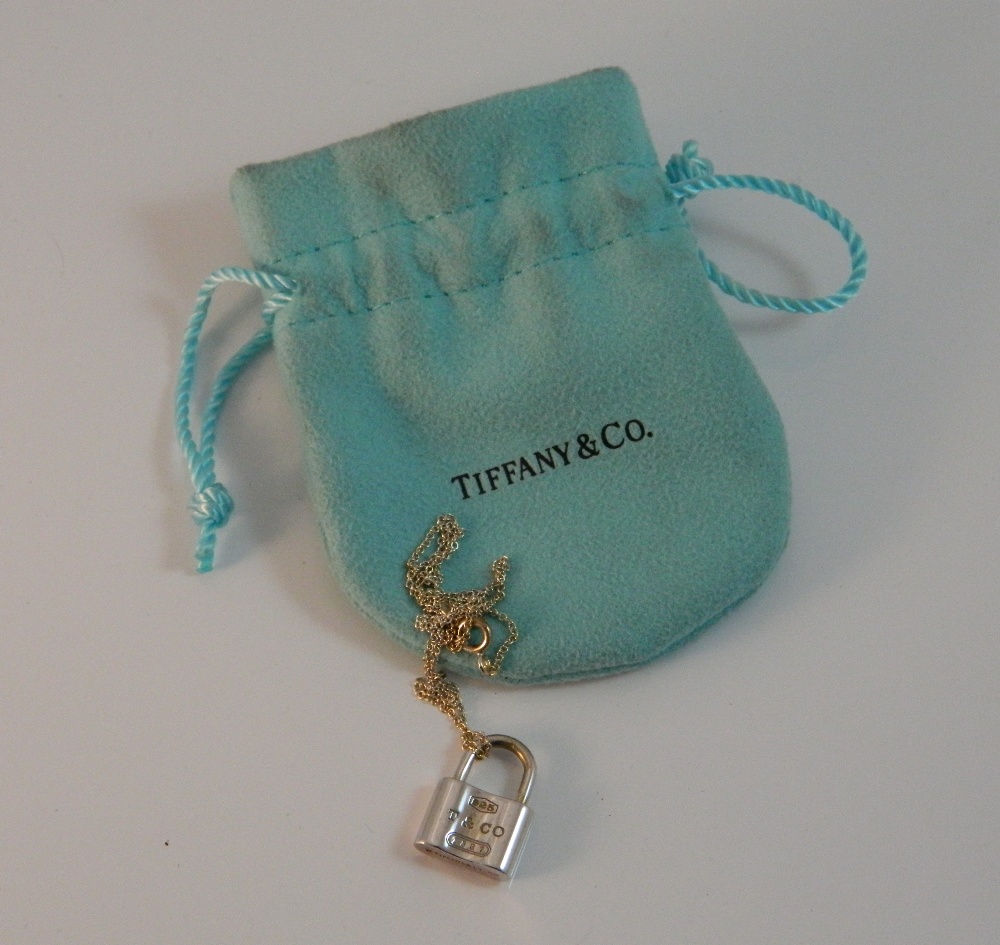 A Tiffany & Co silver padlock pendant