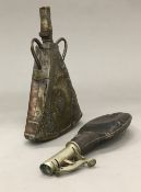 An Eastern copper and brass powder flask,