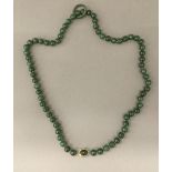 A jade ring and necklace