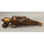 A bronze figure of Buddha modelled reclining