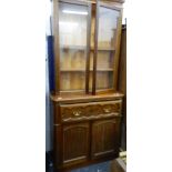 A Victorian secretaire with later top section