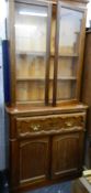 A Victorian secretaire with later top section