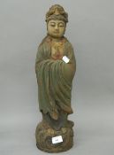 A large Chinese carved wooden model of Guanyin