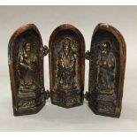 A bronze triptych shrine