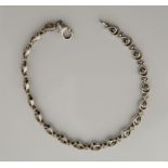 A silver and diamond 'tennis' bracelet