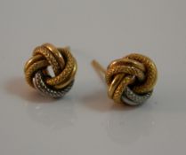 A pair of 9 ct gold knot earrings