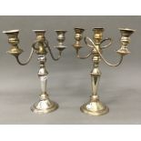 A pair of silver plated candelabra