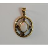 A 9 ct gold opal and ruby pendant (2.