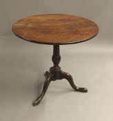 A 19th century mahogany tripod table