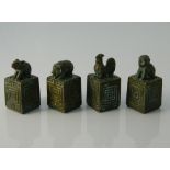 Four small Chinese bronze seals