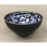 A Chinese Song Dynasty style Jun Ware type bowl. 7 cm high; 12.25 cm diameter.